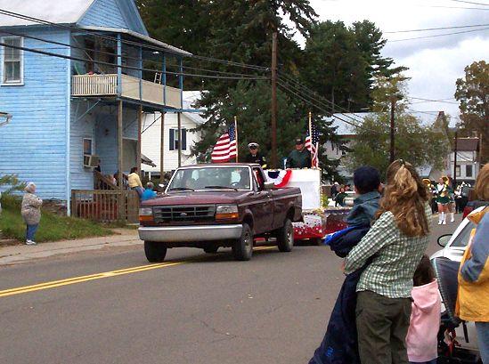 People, parade entries, and activities at the 2006 New Albany Fall Festival.