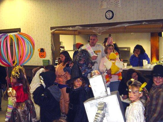 Children and families in costumes at the 2007 New Albany children's Halloween party.
