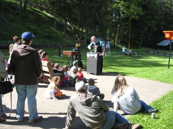 Tim Cleary preforms magic at Memorial Day event. This photograph is from the 2008 Memorial Day.
