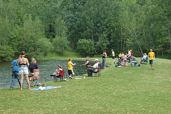 Children, families, and volunteers at the 2010 New Albany Fishing Derby.