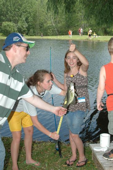 Children, families, and volunteers at the 2010 New Albany Fishing Derby.