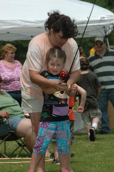 Children, families, and volunteers at the 2010 New Albany Fishing Derby.