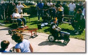Peddle tractor pulls. This photograph is from the 1999 Fall Festival.