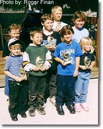 Tractor pull winners. This photograph is from the 1999 Fall Festival.
